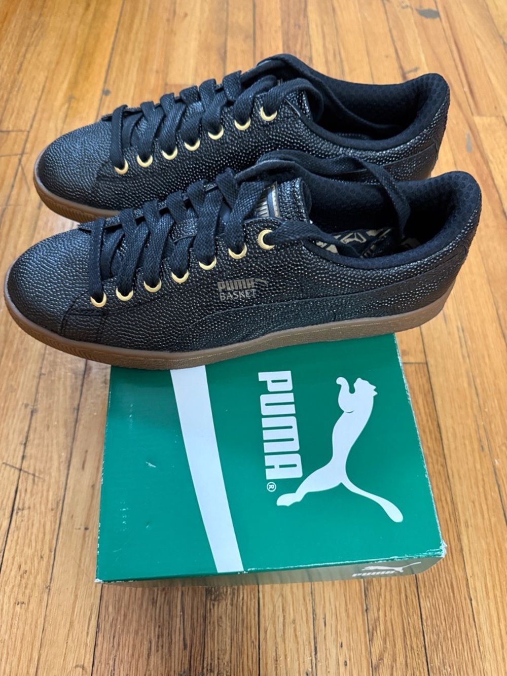 Puma Black Low-Top Sneakers with Gold Eyelets and Gum Sole